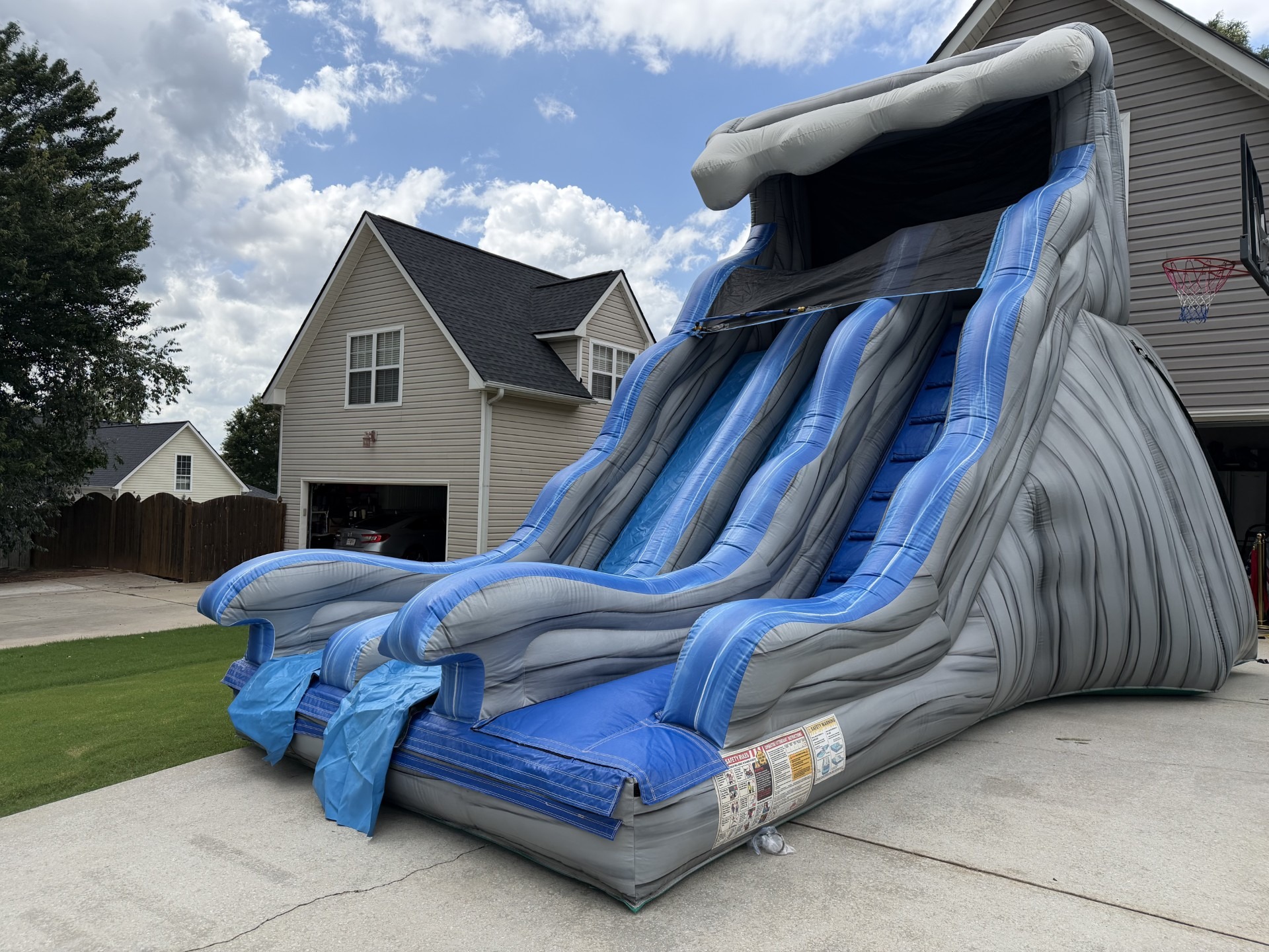How We Clean Our Bounce Houses | Shindigz Event Rentals Newnan, GA 5 Bounce house inflated and drying completely before being rolled and stored to prevent mold and mildew